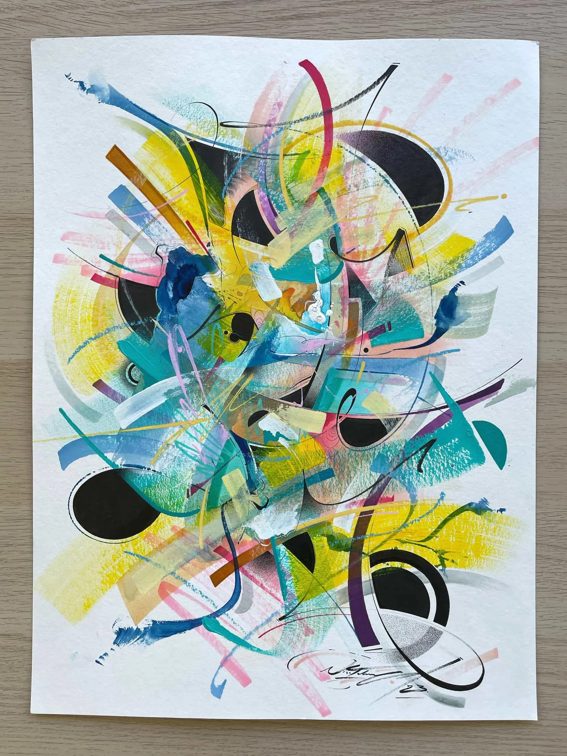Abstract colorful mixed media artwork with splashes, lines, and shapes on paper.