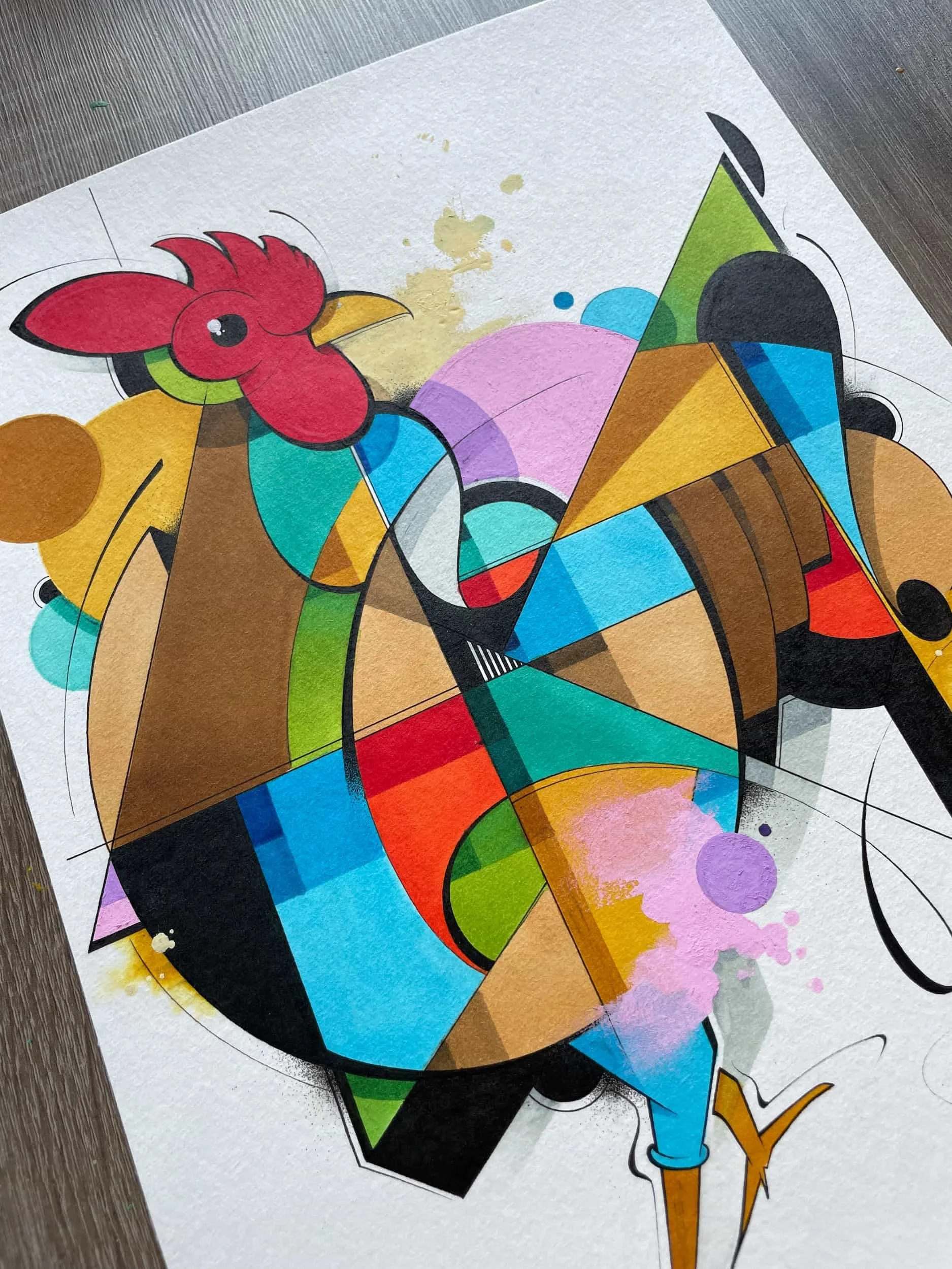 Colorful abstract art featuring a stylized rooster with geometric shapes and bright colors, on textured paper with watercolor splashes.