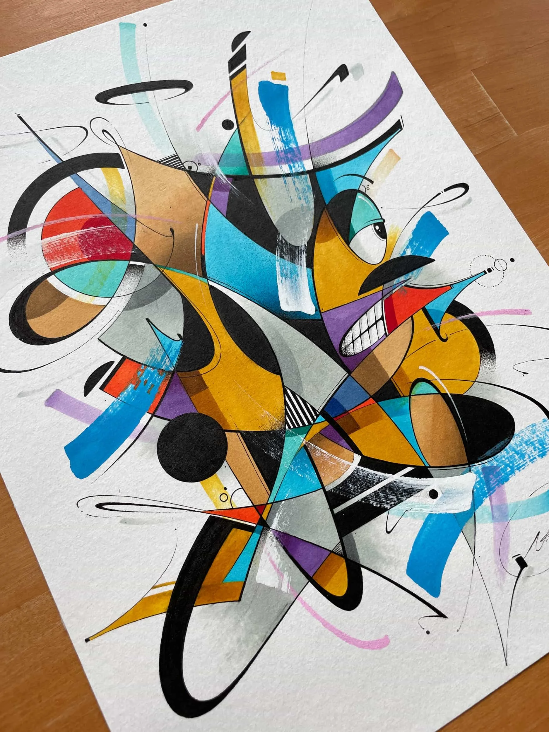 Abstract geometric artwork with colorful shapes and lines on white paper