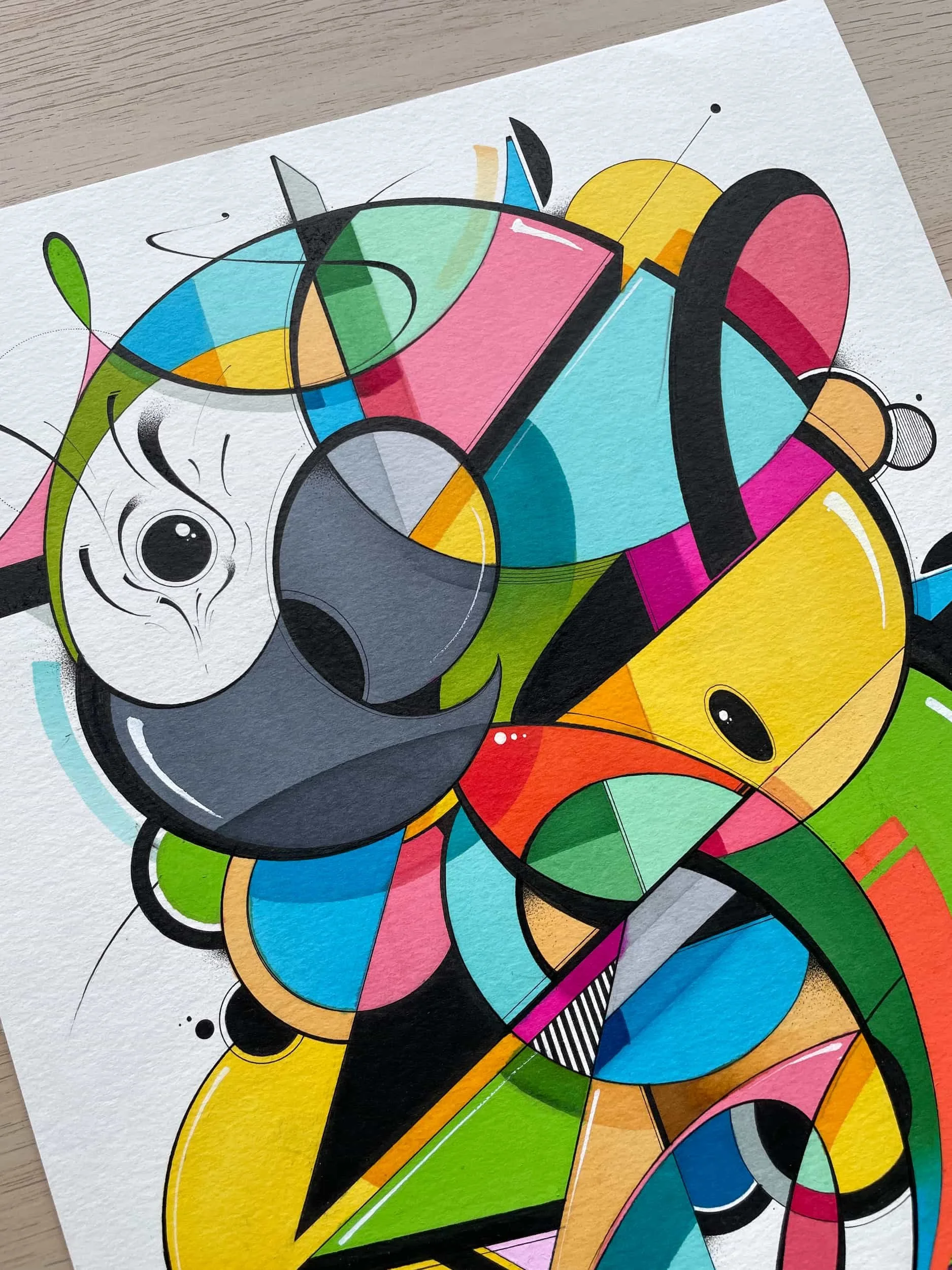 Colorful abstract geometric artwork with various circles, triangles, and lines on textured paper.