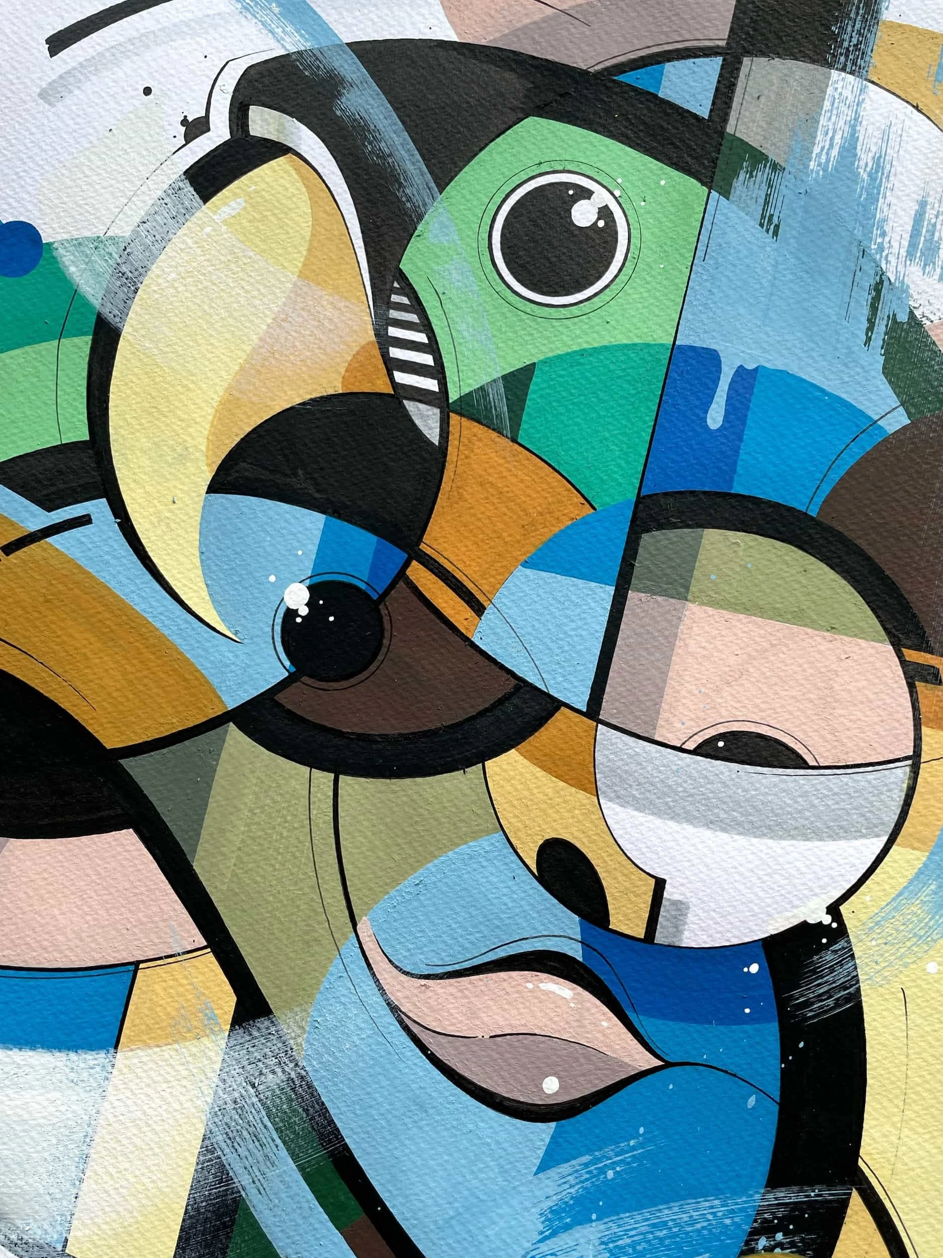 Abstract geometric wall art featuring a stylized animal face with prominent eyes, composed of various colorful shapes and bold lines.