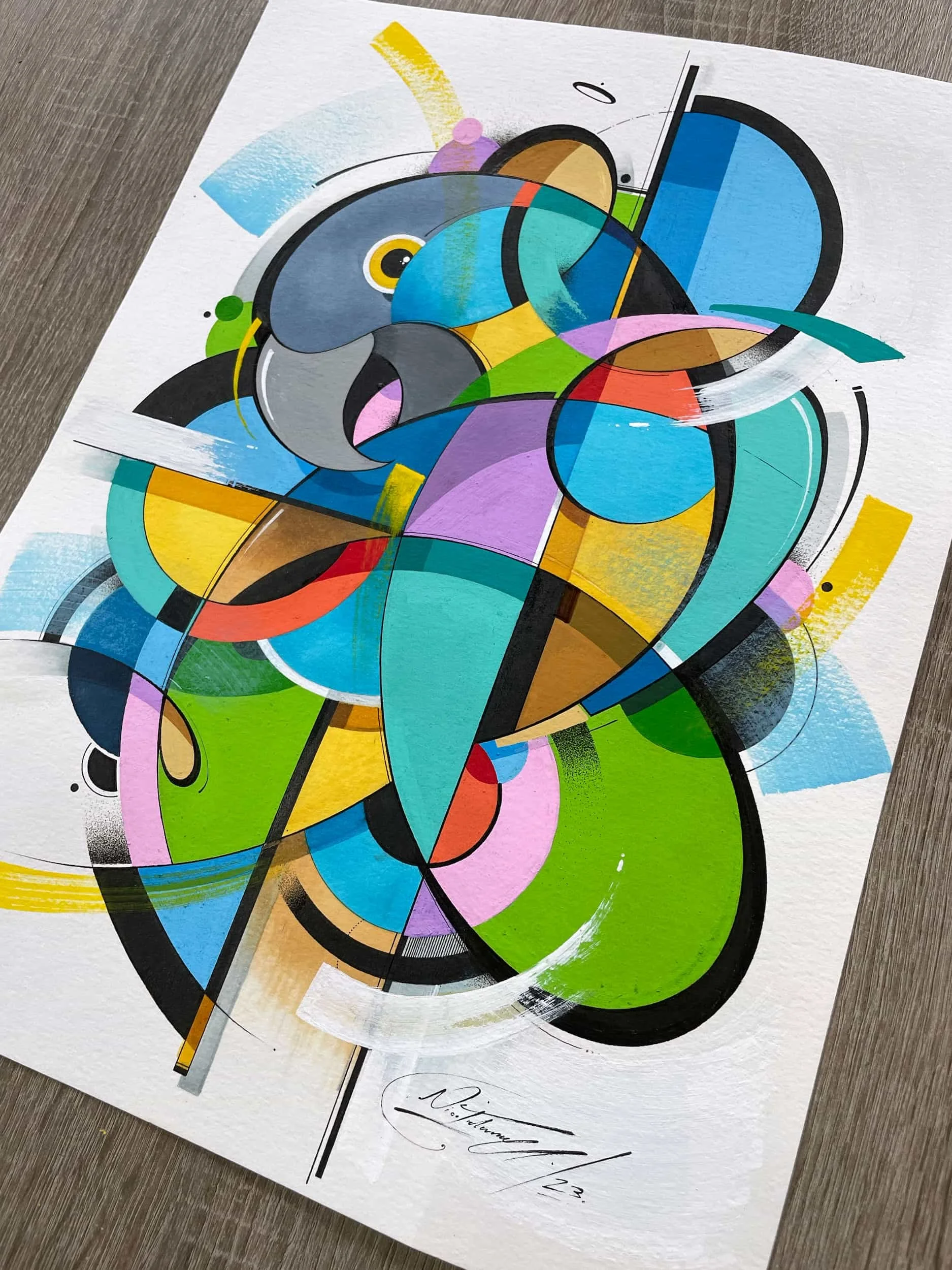 Abstract colorful geometric artwork on paper with signature at bottom.