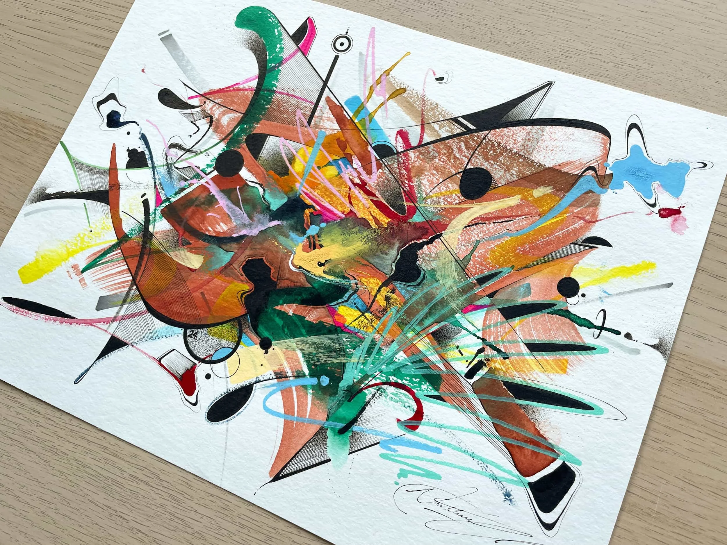 Colorful abstract painting with splashes of red, yellow, green, pink, blue, black, and orange on textured white paper.