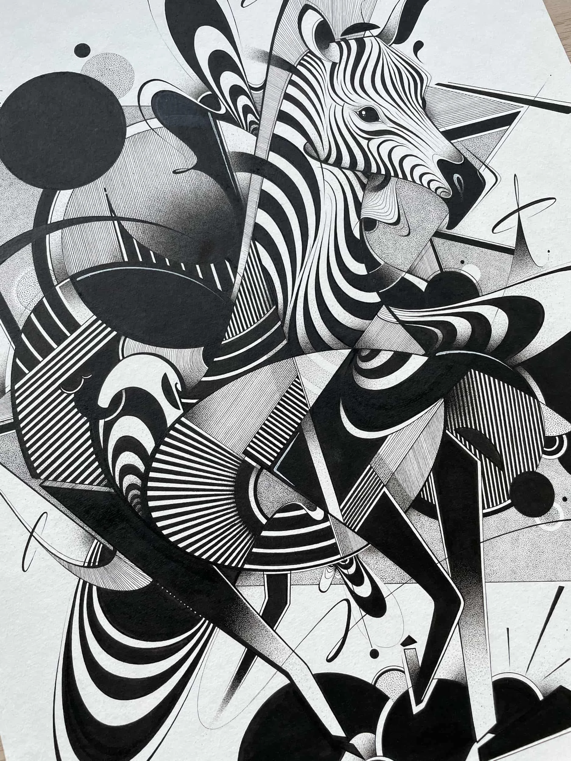 Black and white geometric abstract art featuring a stylized zebra combined with various shapes and patterns.