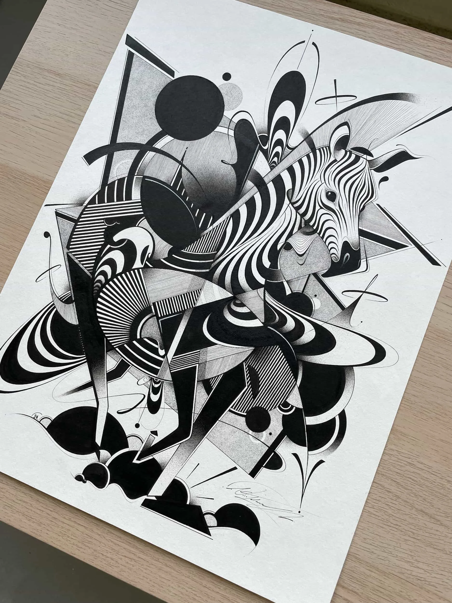 Black and white abstract artwork featuring a zebra with swirling and geometric patterns, surrounded by various shapes and lines.