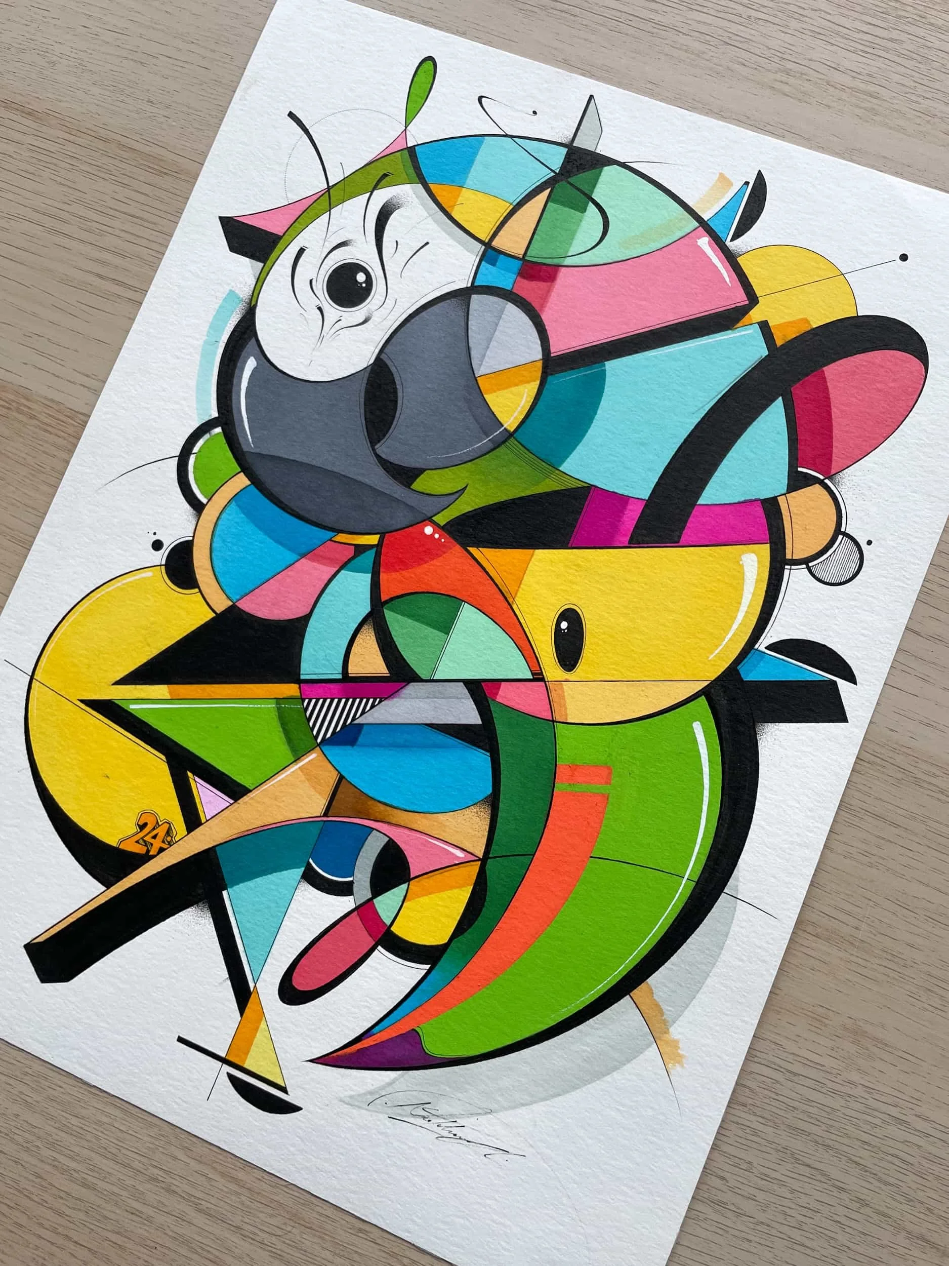 Abstract colorful geometric art with various shapes and lines on paper.
