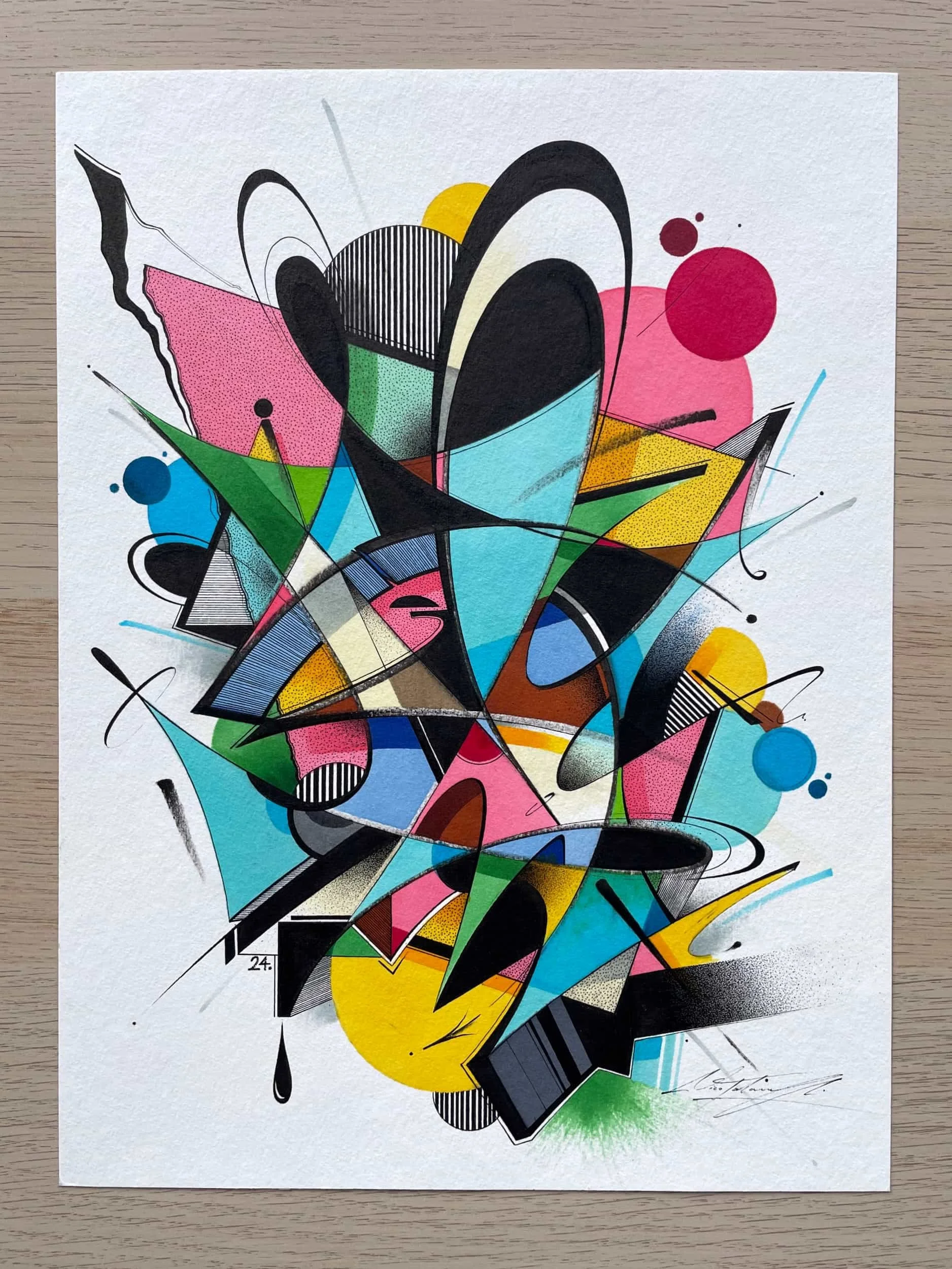 Abstract graffiti art with colorful shapes, lines, and splashes on paper.