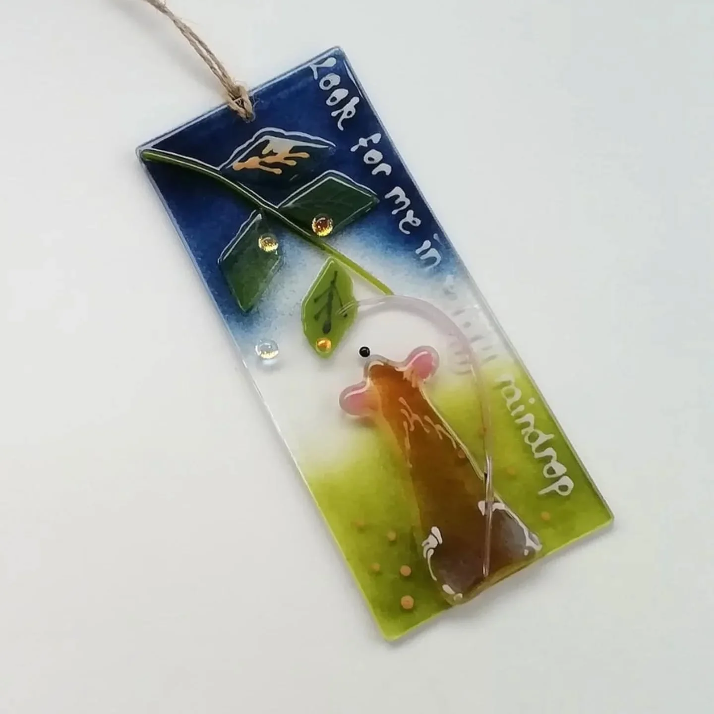 "Look for me on every raindrop". Sweet little doormouse suncatcher in the Folksy shop. 
#doormouse 
#daffyd 
#buyhandmade 
#folksyseller 
#fusedglass