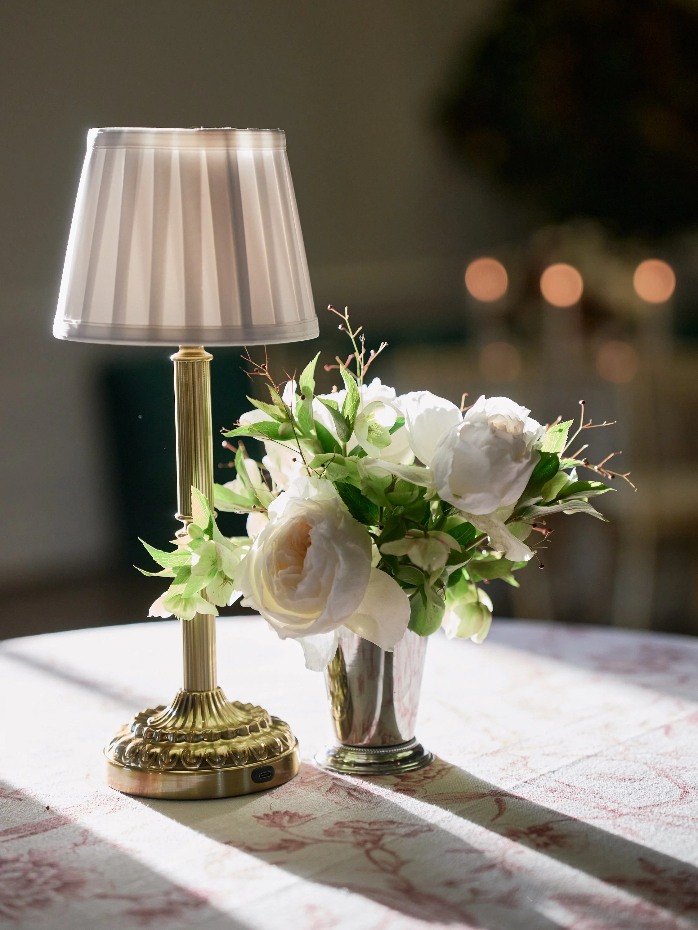 Romantic and simple floral arrangement for an upscale wedding reception