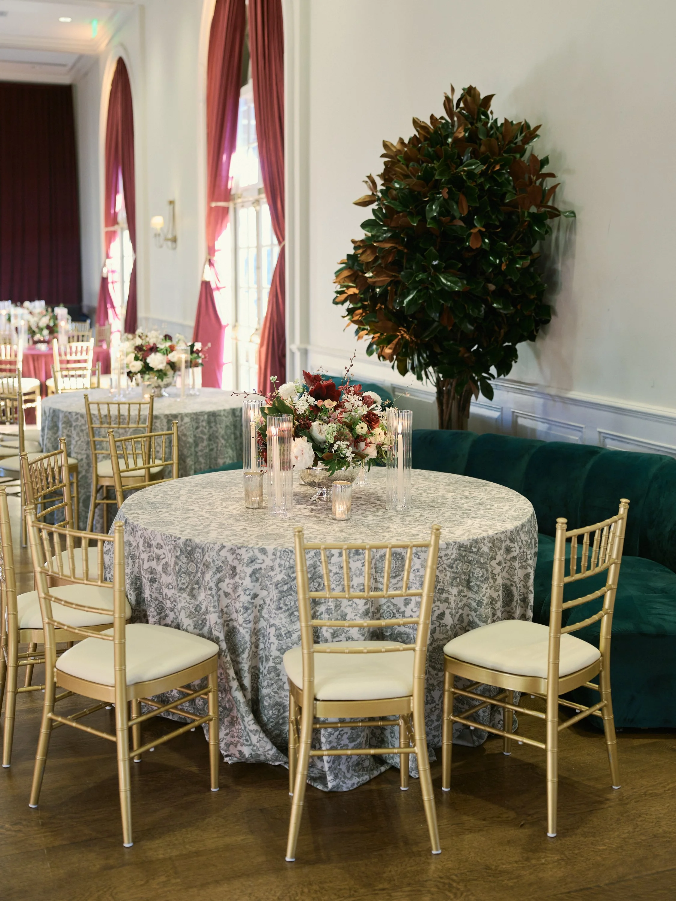 Thoughtfully designed tablescape and stunning magnolia leaf floral piece