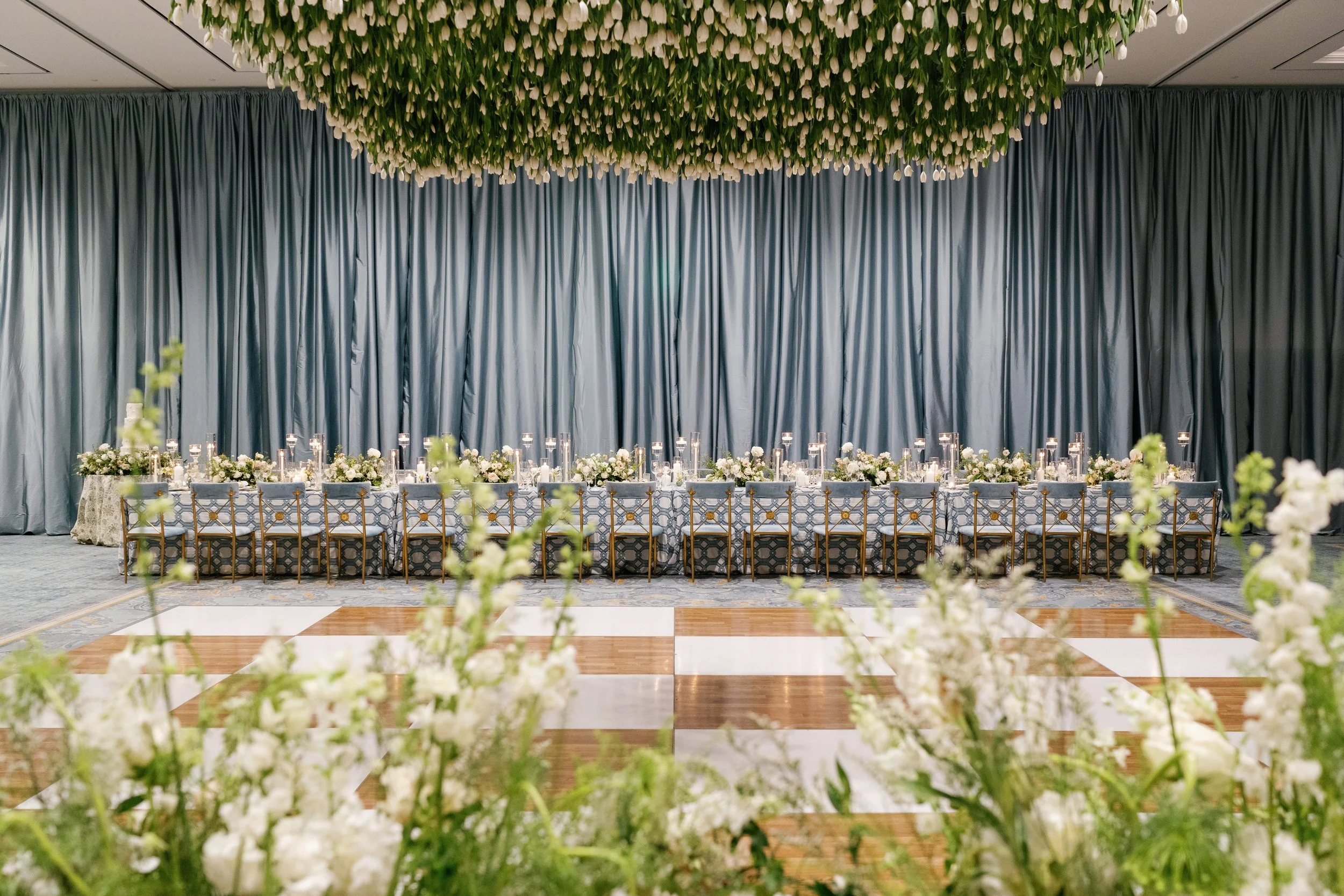 Stunning florals at Palmetto Bluff including a canopy of thousands of fresh tulips over the dance floor and matching tablescapes