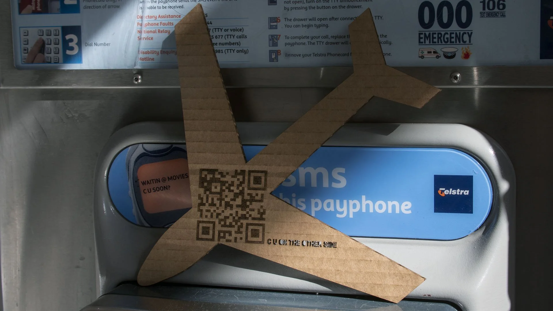 Backyard Psycho (2018)
Manipulated iPhone 6s video | Colour | Stereo Sound |  2' 00" | 23.98 fps |  QR codes embedded in two photographic prints & laser-cut cardboard  | public phone booth