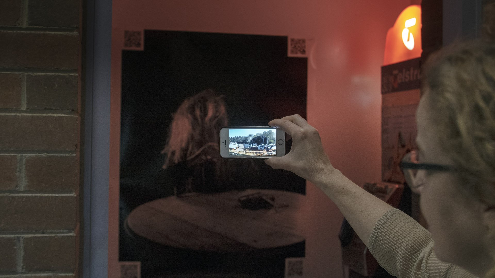 Backyard Psycho (2018)
Manipulated iPhone 6s video | Colour | Stereo Sound |  2' 00" | 23.98 fps |  QR codes embedded in two photographic prints & laser-cut cardboard  | public phone booth