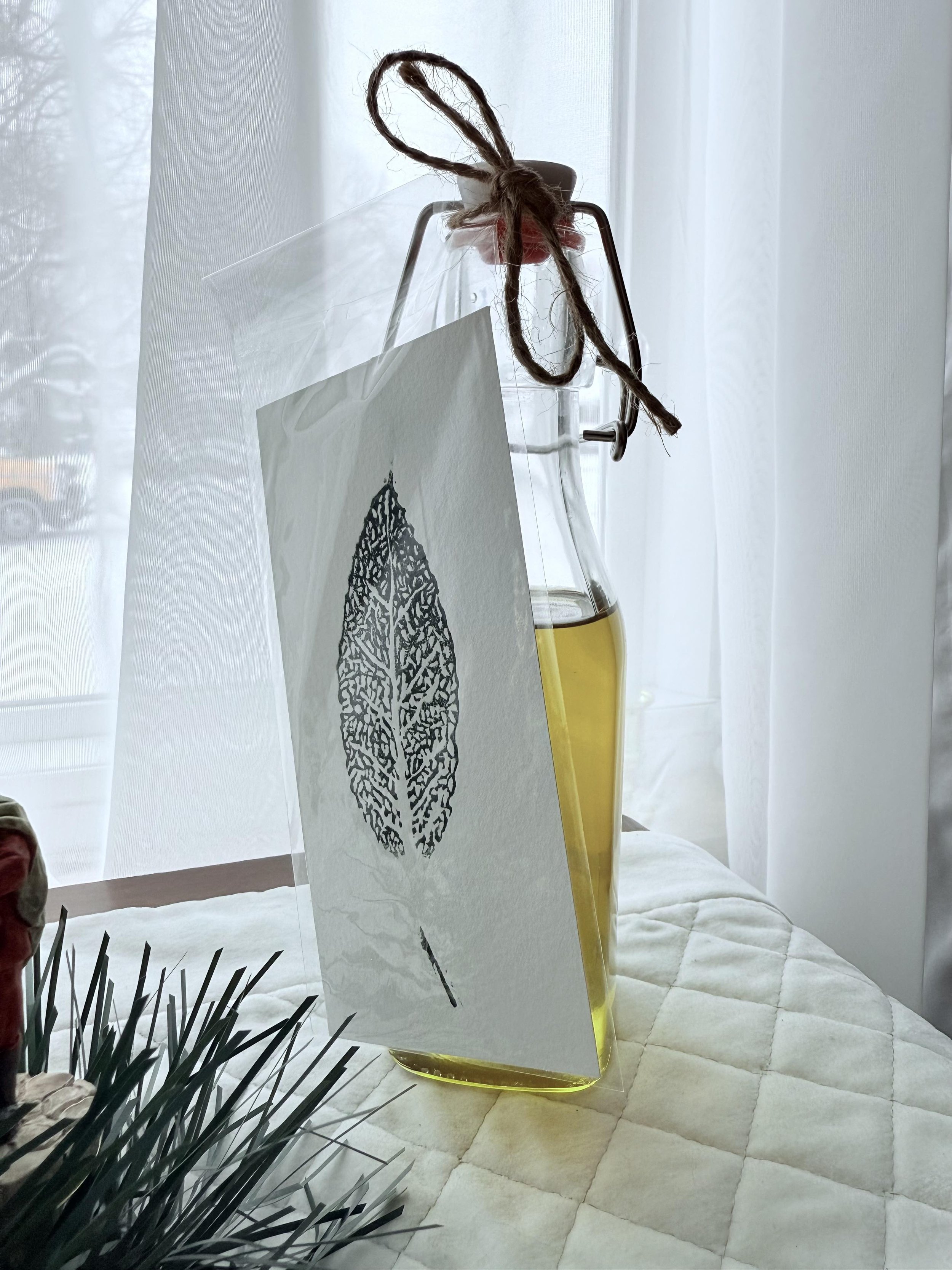 Sage leaf art attached to sage infused olive oil. 2025 Christmas gift. 