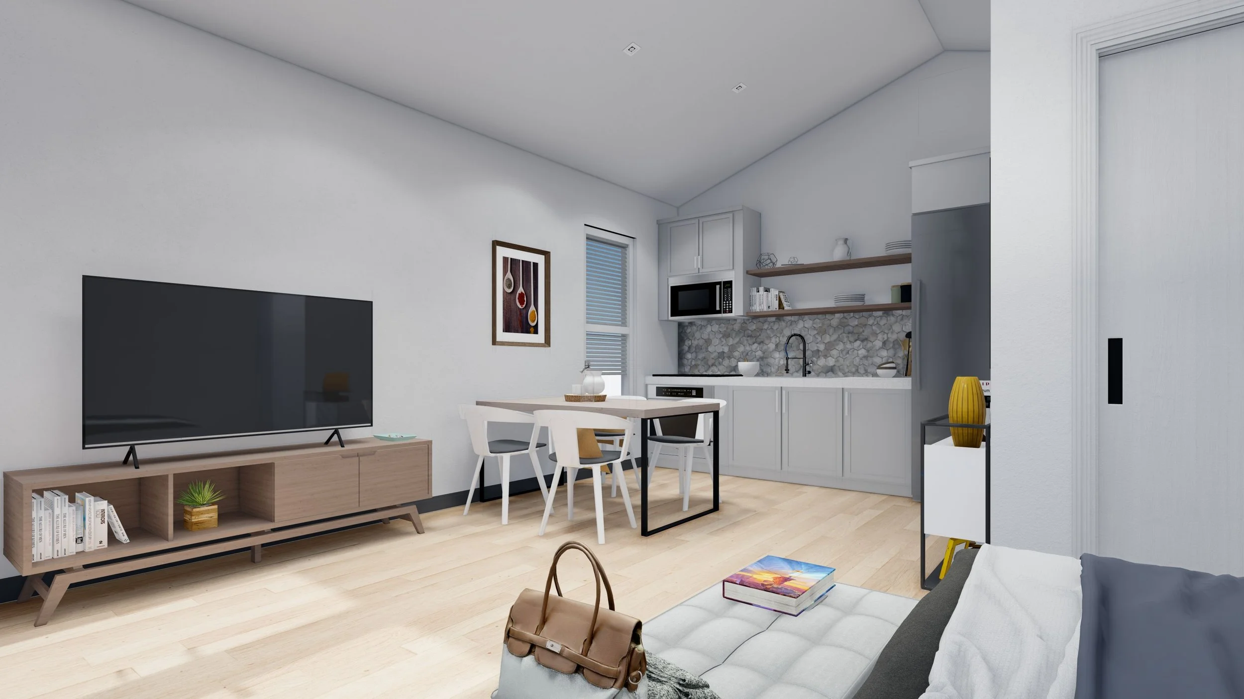 ADU unit render of modern living room with a TV on a wooden stand, dining table with chairs, kitchen area with cabinets, microwave, and open shelves, light wood floor, and sofa with a purse and books.