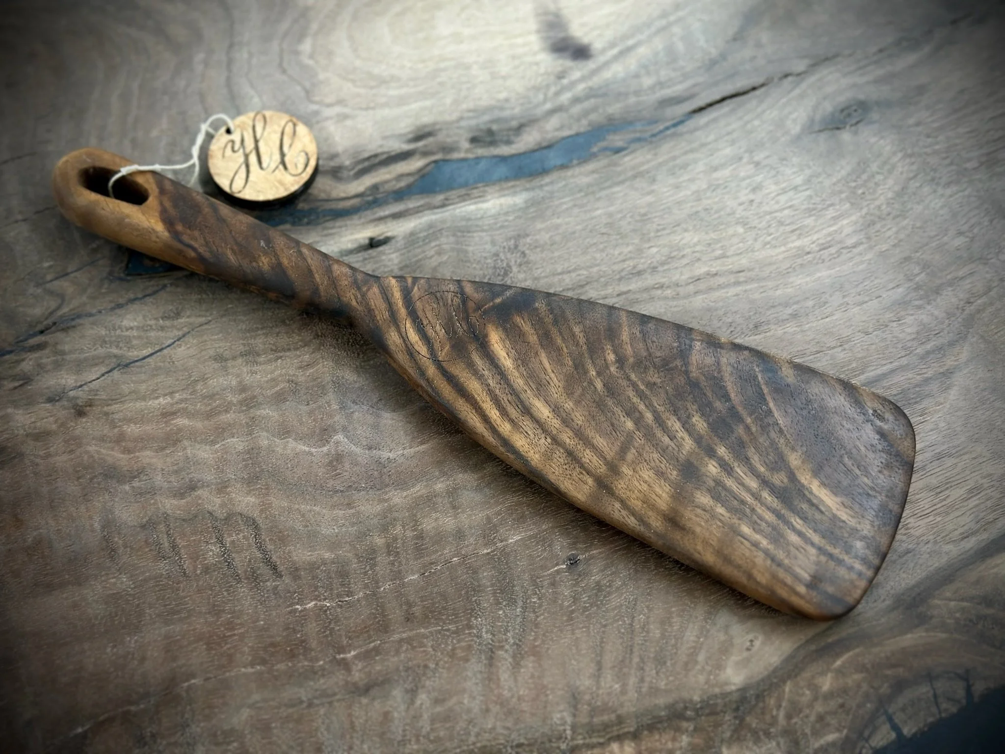 Custom handcrafted wooden kitchen utensils by Handsome Charlie’s Customs in Lexington, Kentucky, made from premium hardwood with expert craftsmanship, featuring smooth finishes, ergonomic design, and durable food-safe construction.