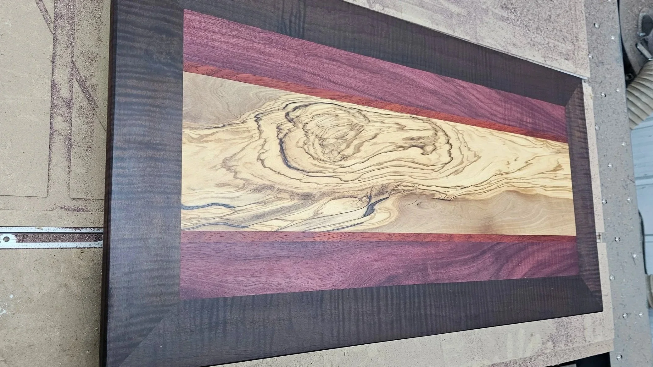 Custom handcrafted coffee table by Handsome Charlie’s Customs in Lexington, Kentucky, made from premium hardwood with expert craftsmanship, highlighting natural wood grain, custom design, and high-quality furniture construction.