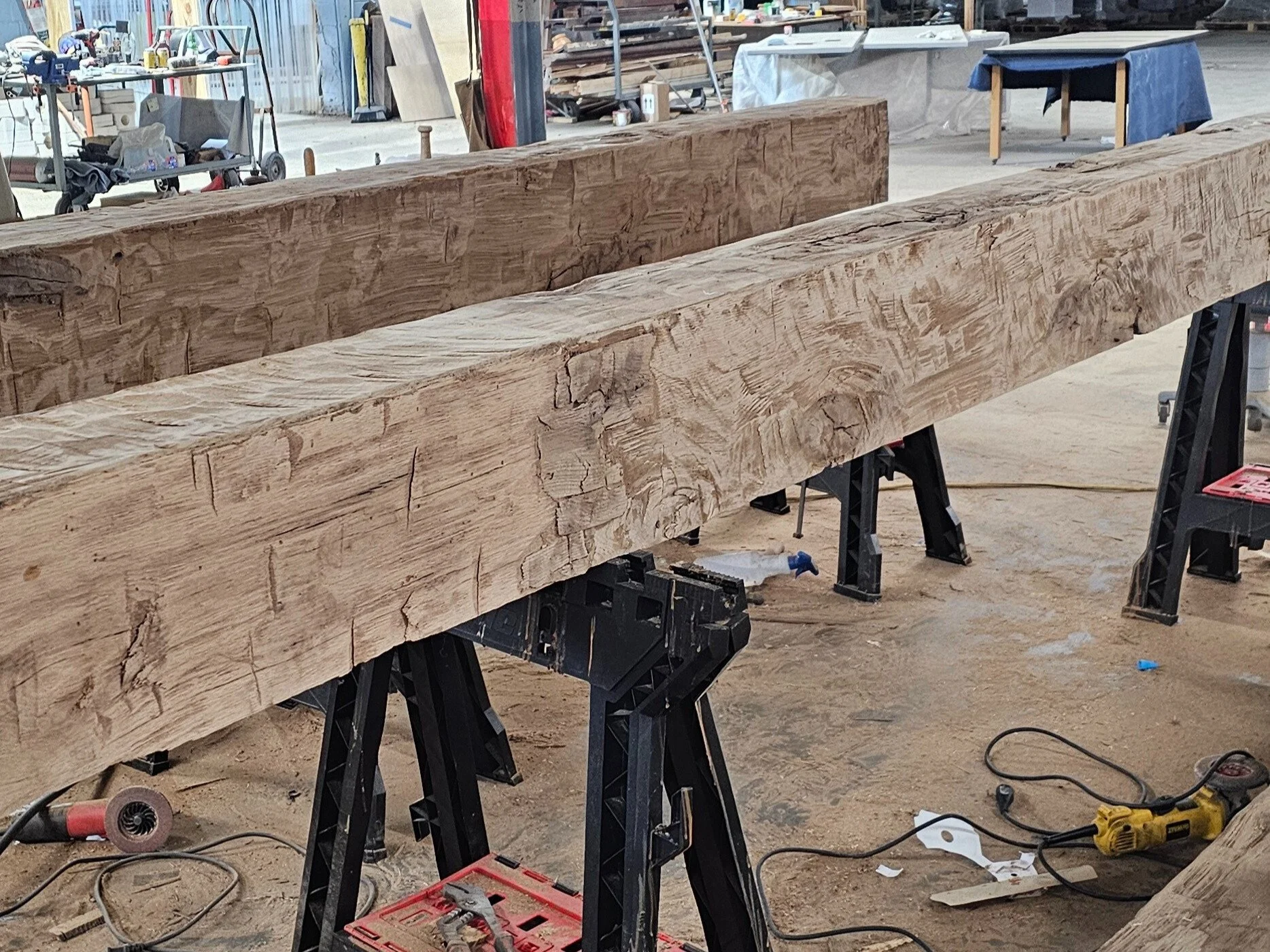 Custom hand-hewn box beams crafted by Handsome Charlie’s Customs in Lexington, Kentucky, built from premium hardwood with rustic texture, authentic timber detail, and expert craftsmanship for custom homes and interiors.