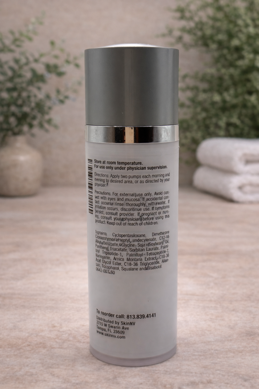 Skincare bottle outdoors with text details.png
