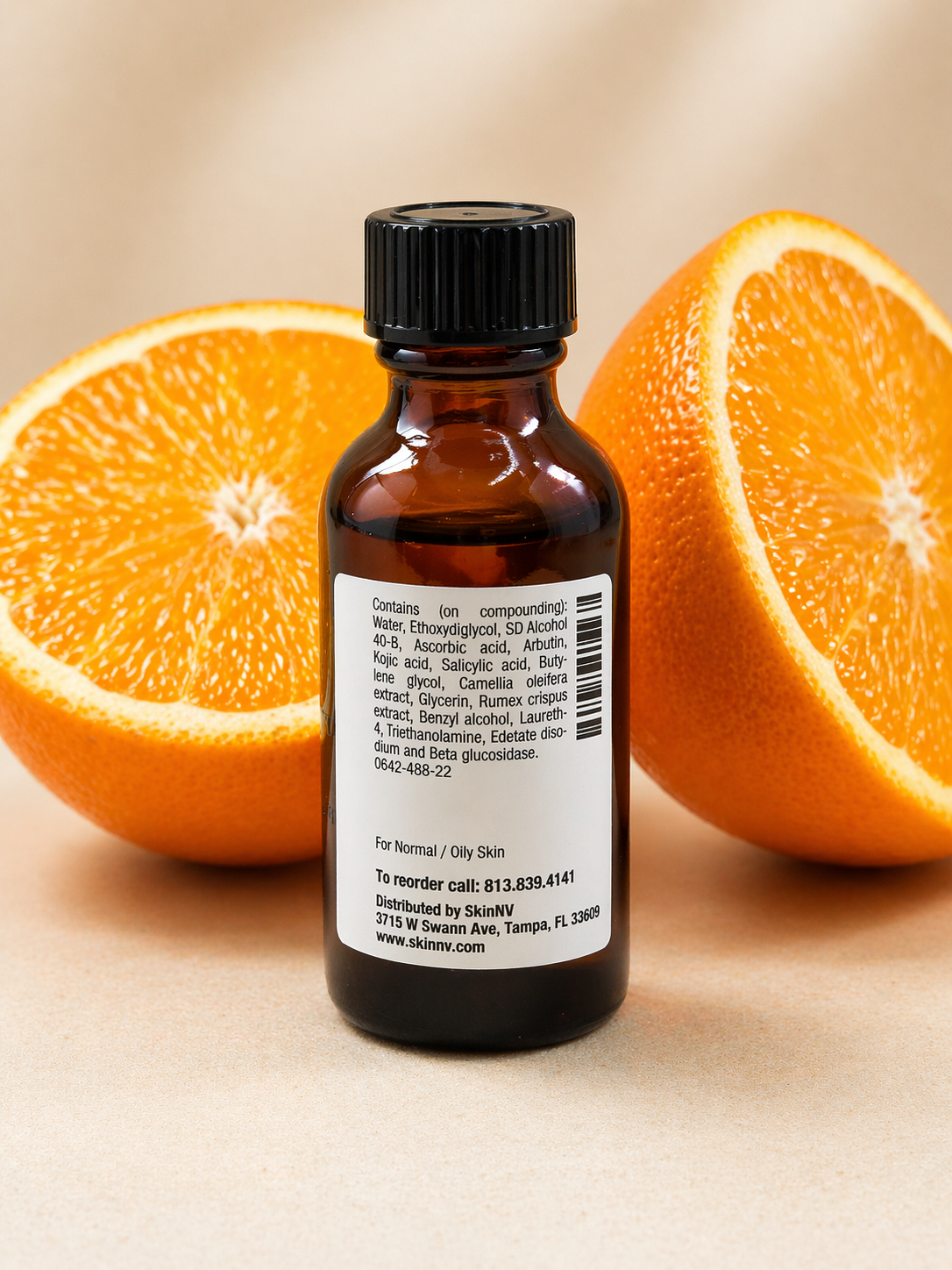 Citrus and skincare product still life.png