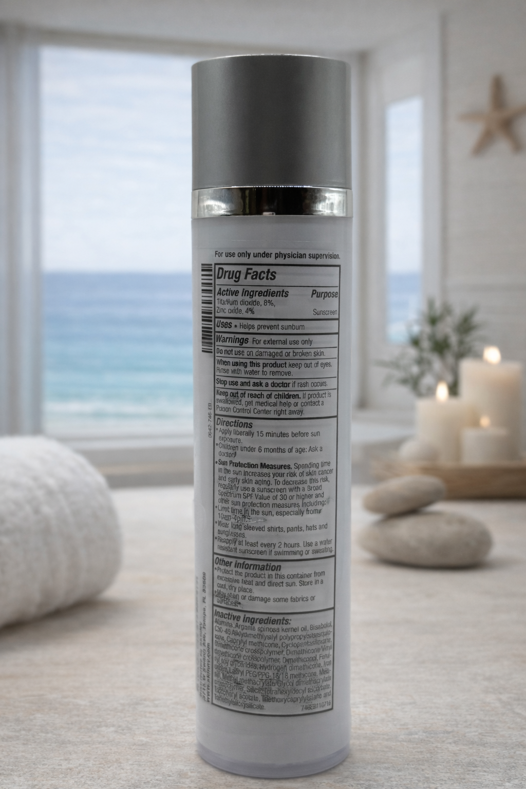 Sunscreen bottle with coastal view.png