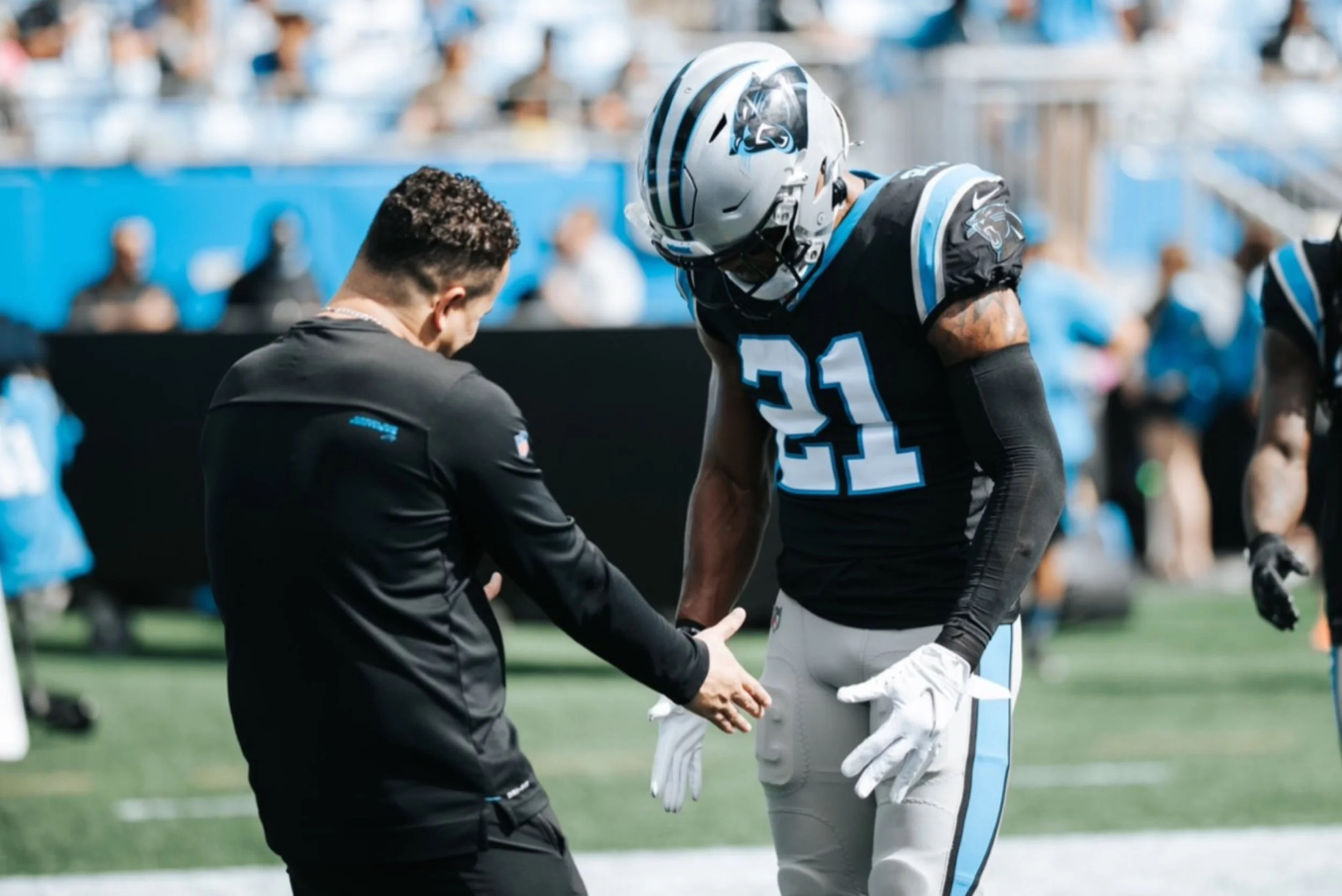 Performance specialist Ale Oliveira pictured with Cam Newton representing work with professional NFL athletes and high-performance clients.
