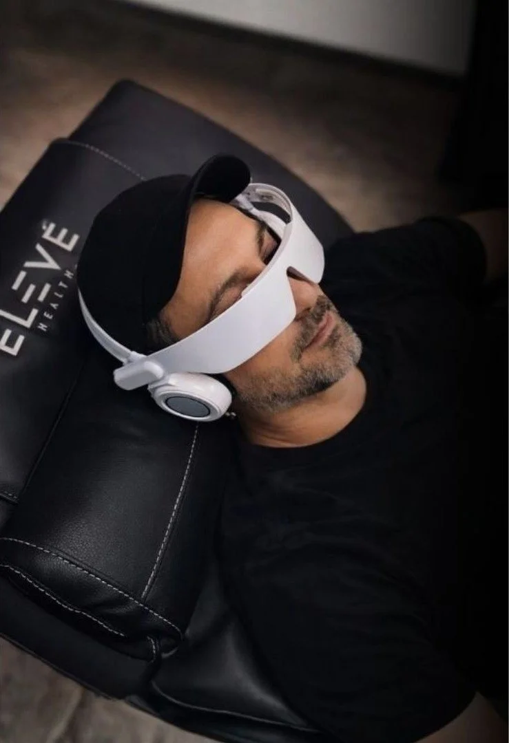 Man receiving vibroacoustic therapy at Aptare Lab to support nervous system regulation, relaxation, and recovery enhancement.