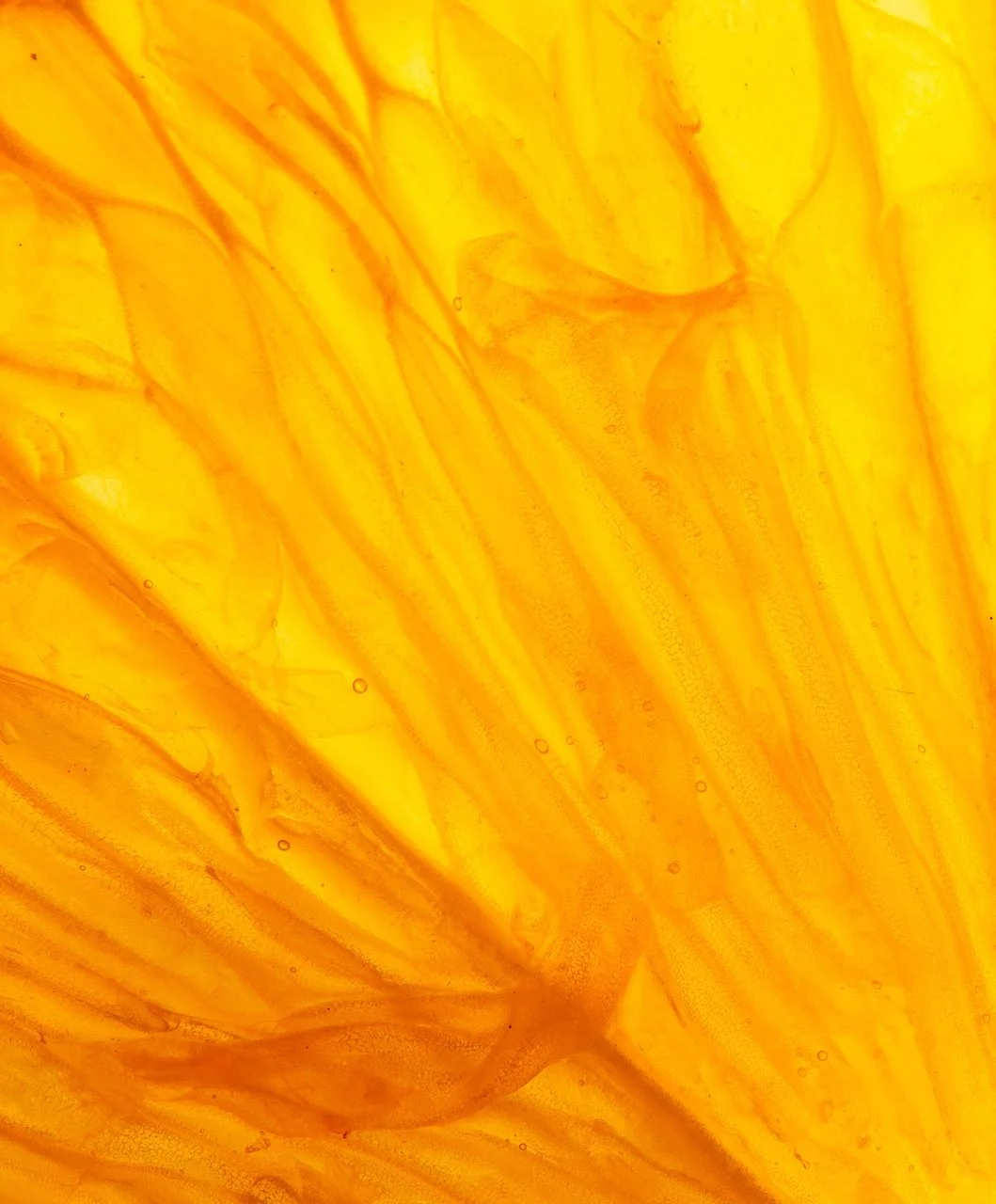 Abstract yellow and orange marbled pattern.
