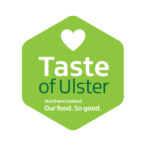 Green hexagon logo with a white heart at the top, and text reading "Taste of Ulster, Northern Ireland, Our food. So good."