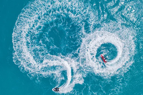 Jet skis on turquoise water