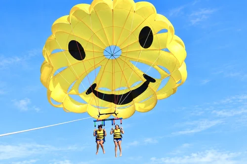 Parasailing over turquoise water in Miami