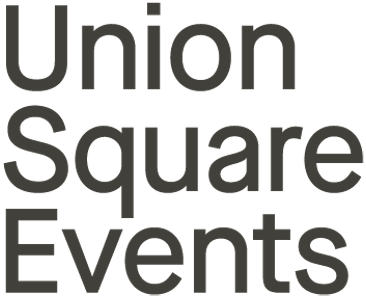Text-based logo for Union Square Events with black background and gray text.