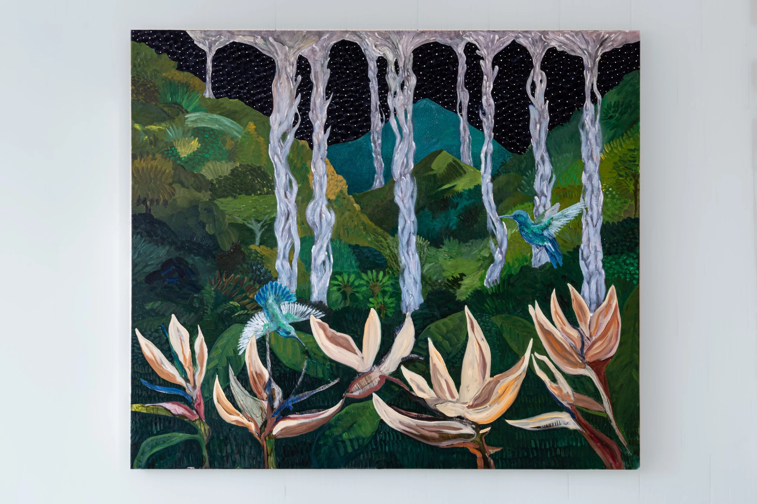 A colorful painting of a lush green jungle with mountains in the background, featuring waterfalls flowing from the treetops and three hummingbirds flying among tropical plants.