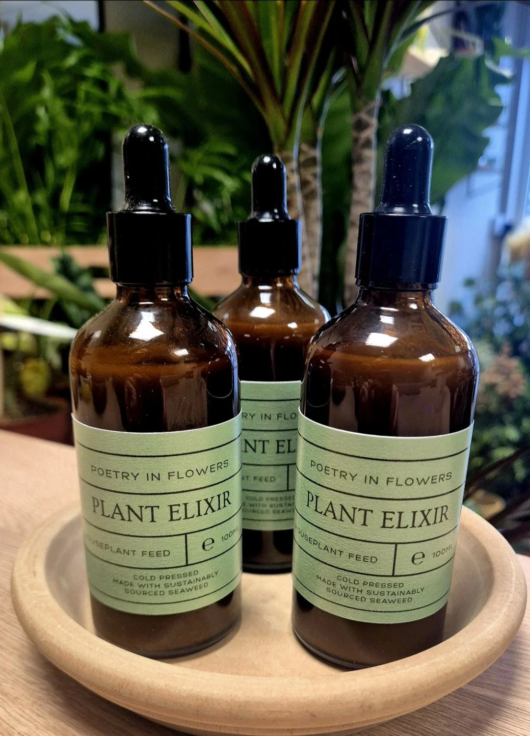 Poetry in Flowers Plant Elixir seaweed plant feed in amber glass dropper bottles