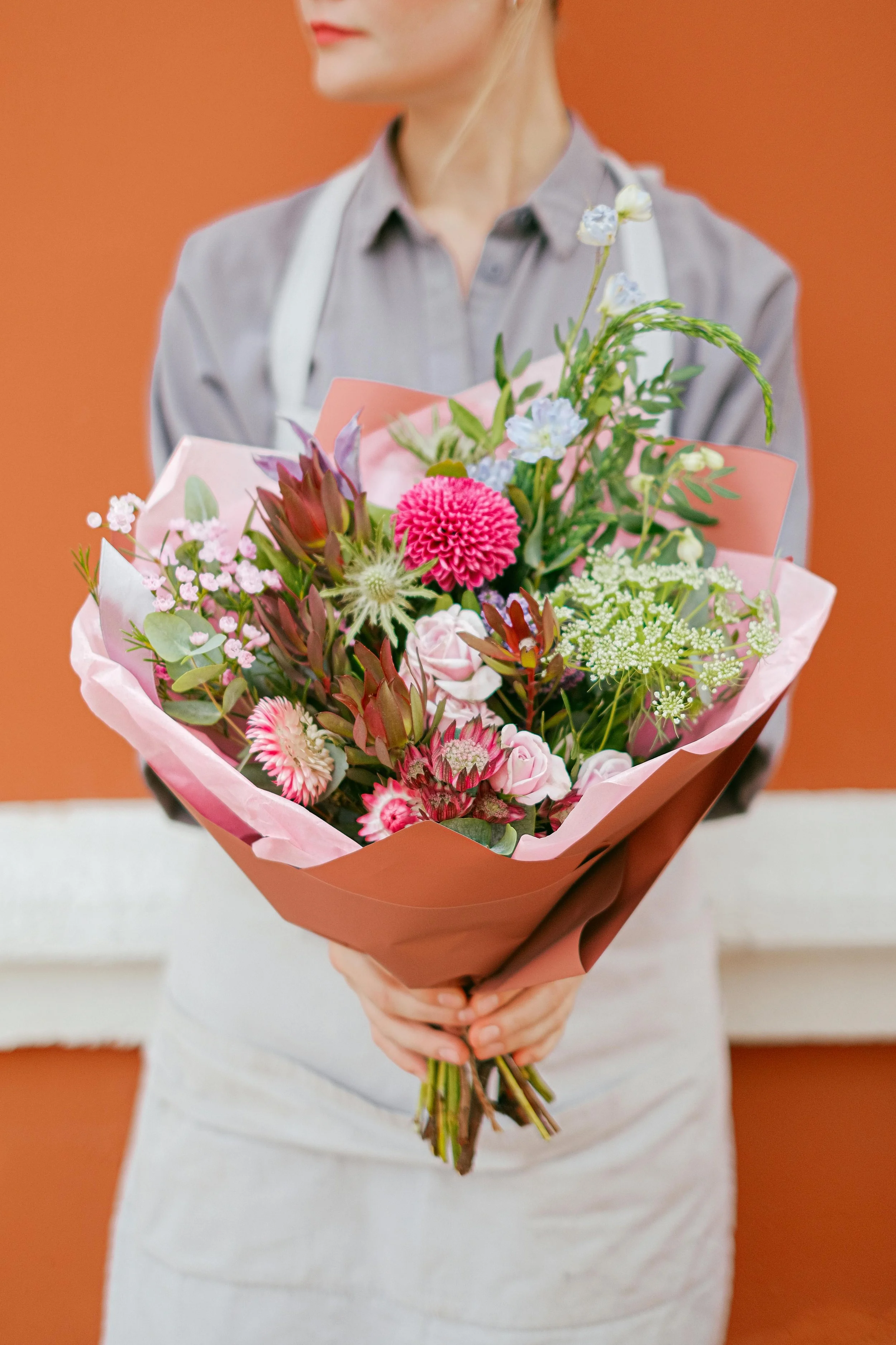 Florist's choice hand-tied bouquet inspried by the language of flowers, featuring seasonal blooms in natural tones.