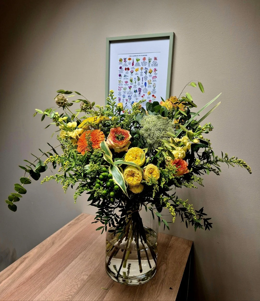 Mother's Day vase arrangement with seasonal flowers by Poetry in Flowers florist in Hednesford Staffordshire.