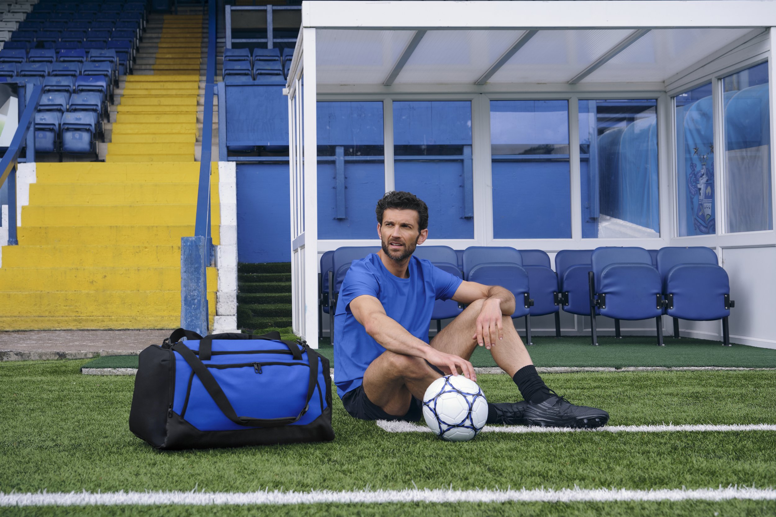 QS270 Pro Team Holdall - Royal-Black (Lifestyle shot)-Lifestyle Extra Large.jpg