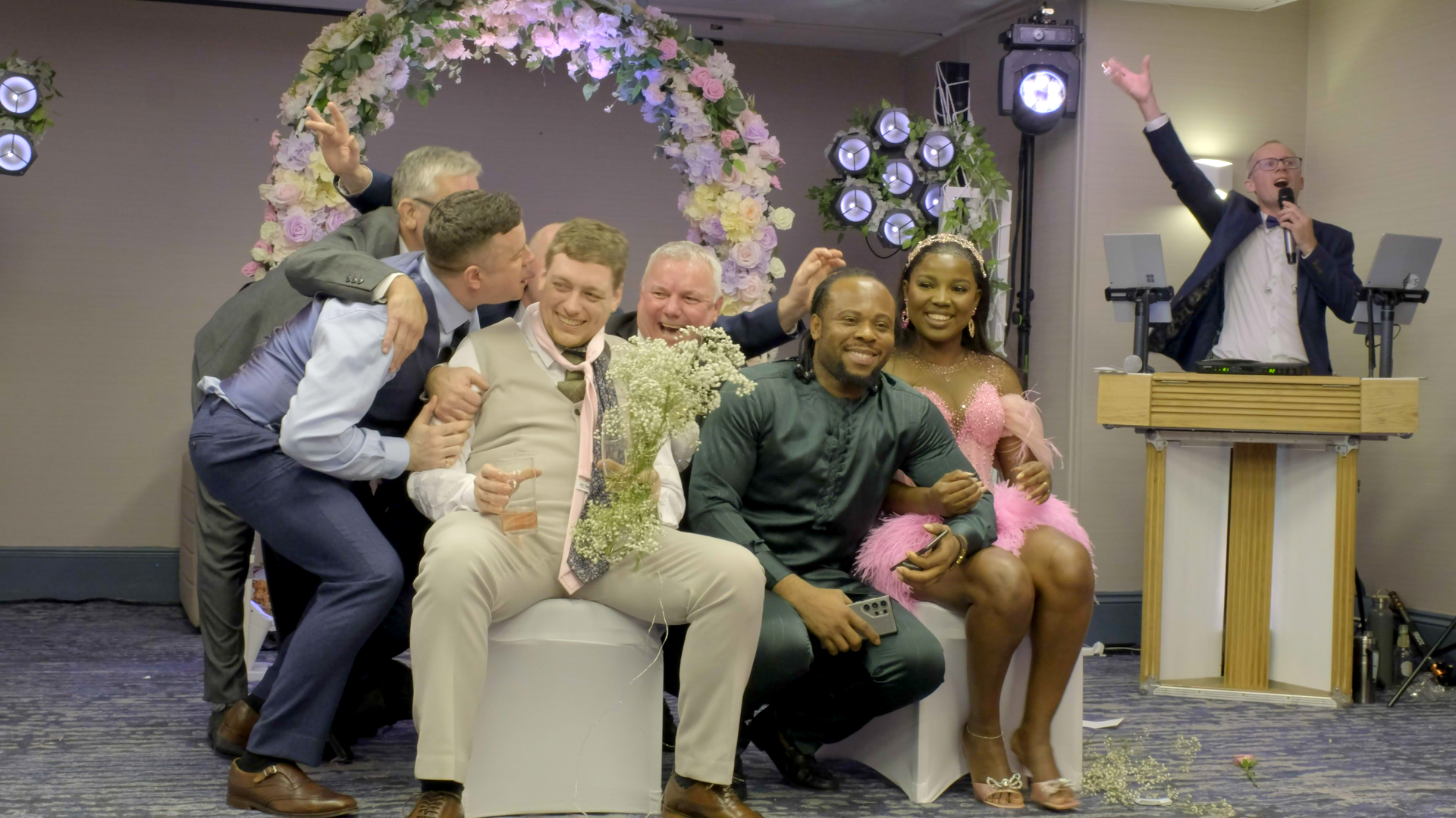 A joyful wedding moment that brings guests together and lifts the atmosphere