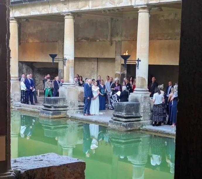 Sally and Dean making their vows at Roman Baths