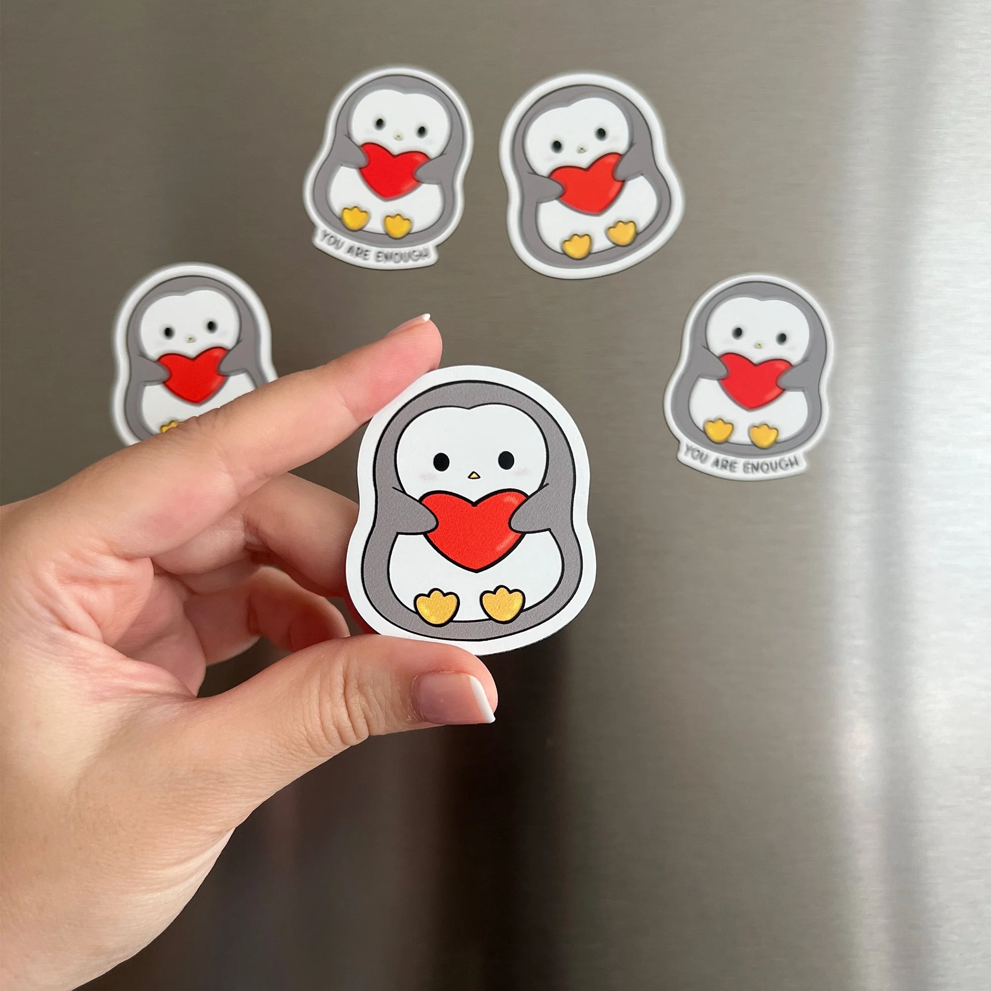 penguin holding heart.jpg