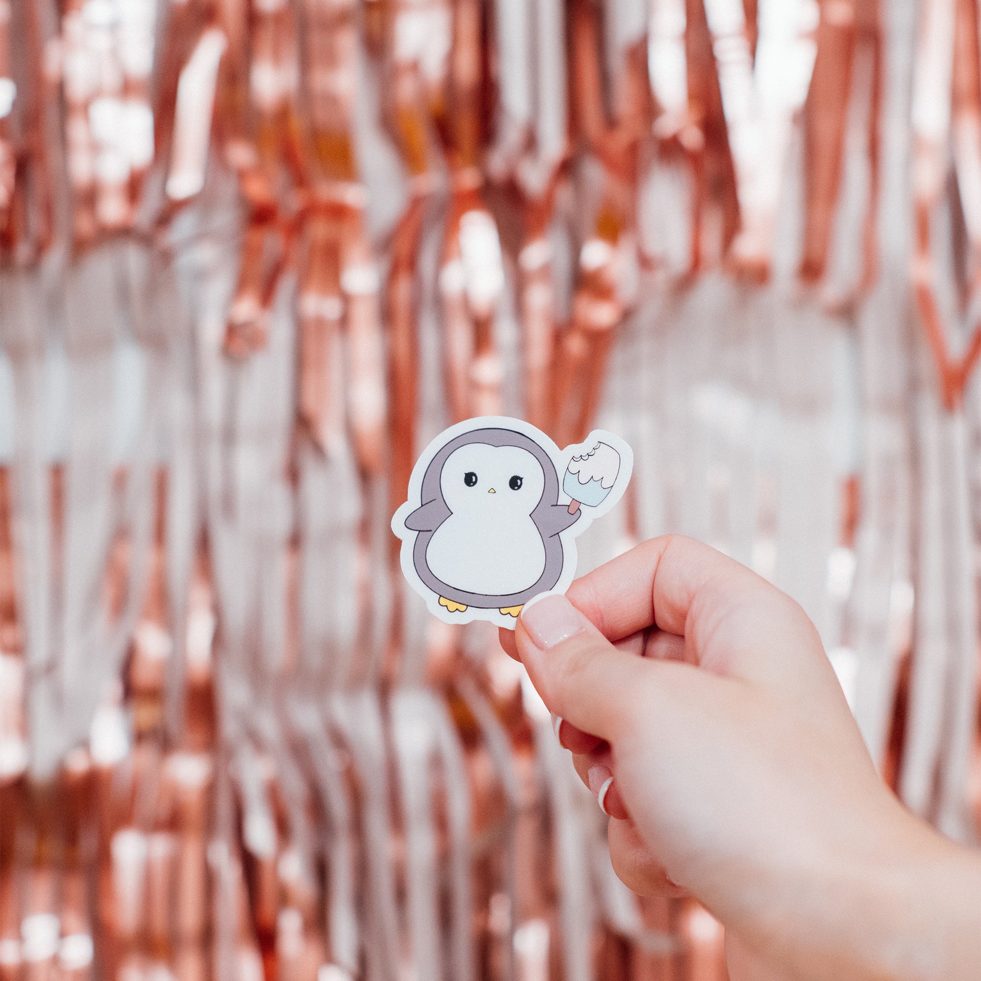 Penguin with popsicle sticker