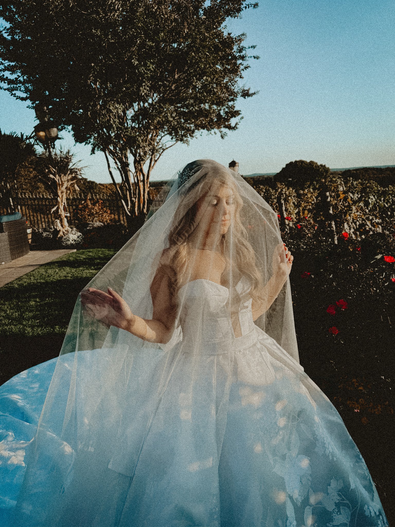 bride under veil bts wedding content creator