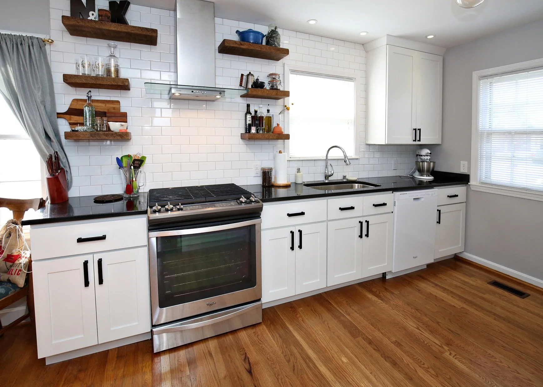 White shaker cabinets This creates a timeless, versatile look that works with many kitchen styles — from traditional to modern farmhouse.