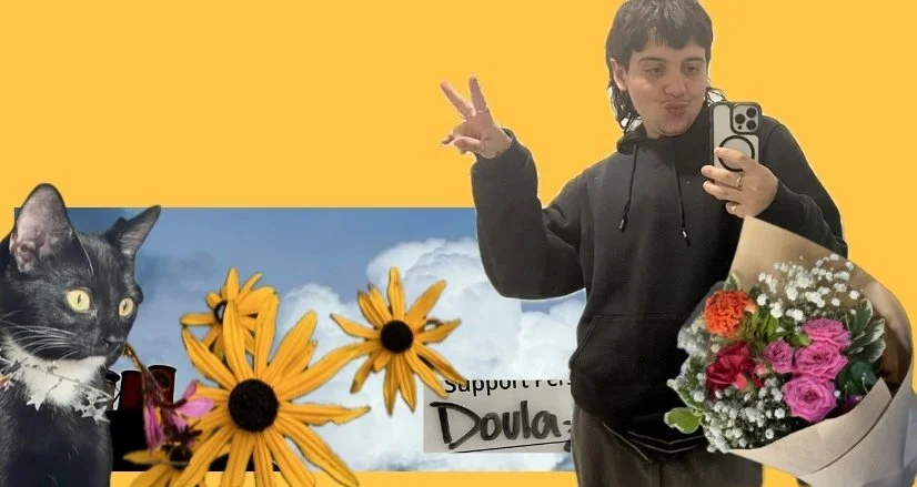 A person taking a mirror selfie holding a bouquet of flowers with a cat on their shoulder. The background includes a promotional poster with a cat, yellow flowers, a sky with clouds, and the words 'Support for Doula'.