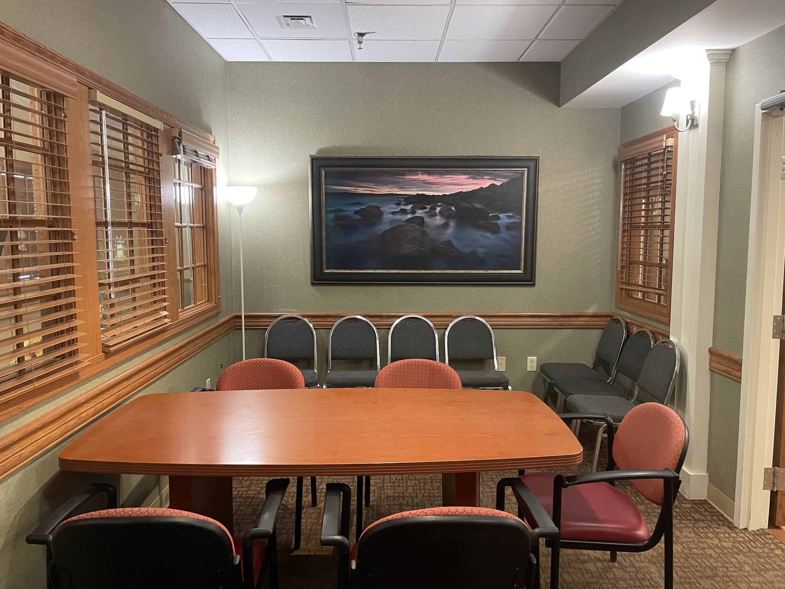 Private conference room at Fieldstone Nursing and Rehabilitation Center with large seating table, ideal for family meetings and care planning discussions.