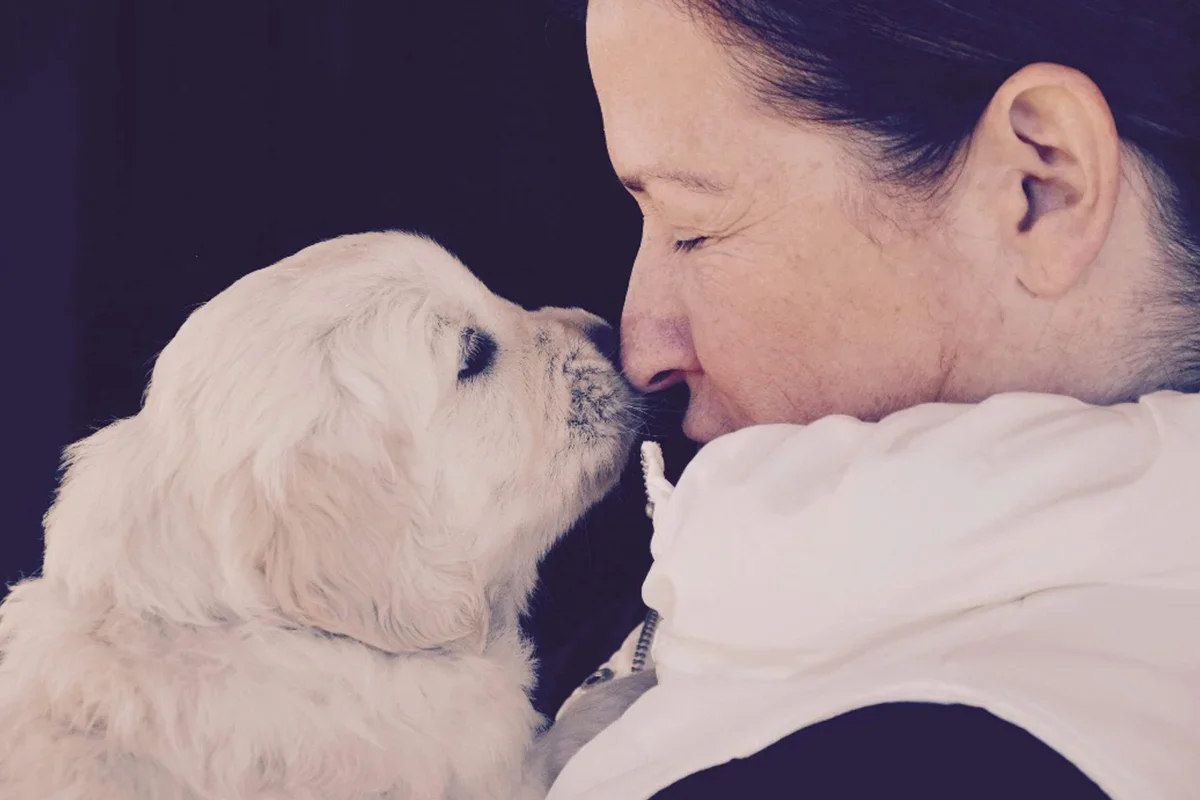 cloud the therapy dog and Carrie Hammond