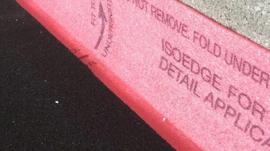 Pink iso edging marking on ground indicating to see detailed acoustic application for a liquid screed floor in Warwickshire.