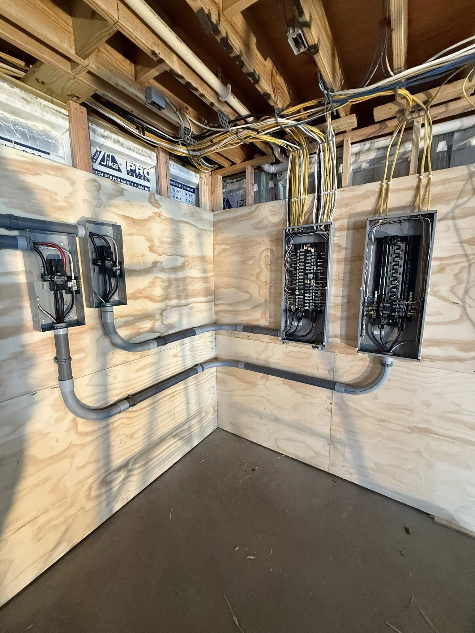 Multiple residential electrical panels and subpanels professionally installed by a NEPA electrical contractor.