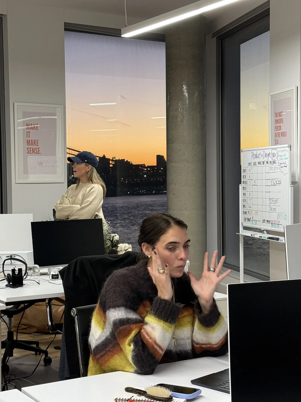 A teammate at her desk in the NYC office
