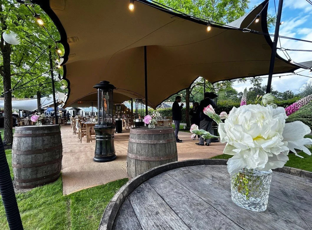 Whiskey barrels to act as poseur tables